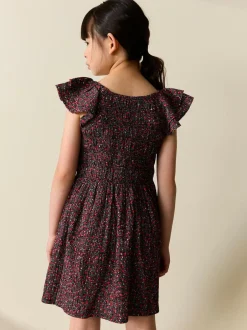 Next Smocked Frill Sleeve Dress (3-16yrs) Black Ditsy