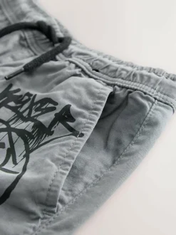 Next Blue Graffiti Loose Fit Cargo Trousers (3-16yrs) Outlet