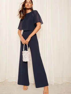 Friends Like These Petite Chiffon Flutter Sleeve Scuba Jumpsuit Navy Blue New