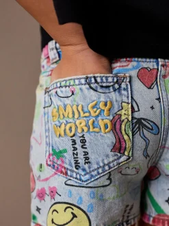 Next Mid Blue SmileyWorld® Graffiti Print Denim Shorts (3-16yrs) Clearance