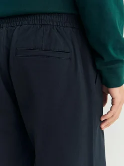 Next Regular Tapered Fit Pleated Stretch Chinos Trousers With Elasticated Waist Navy Hot
