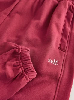 self. Red Cuffed Joggers