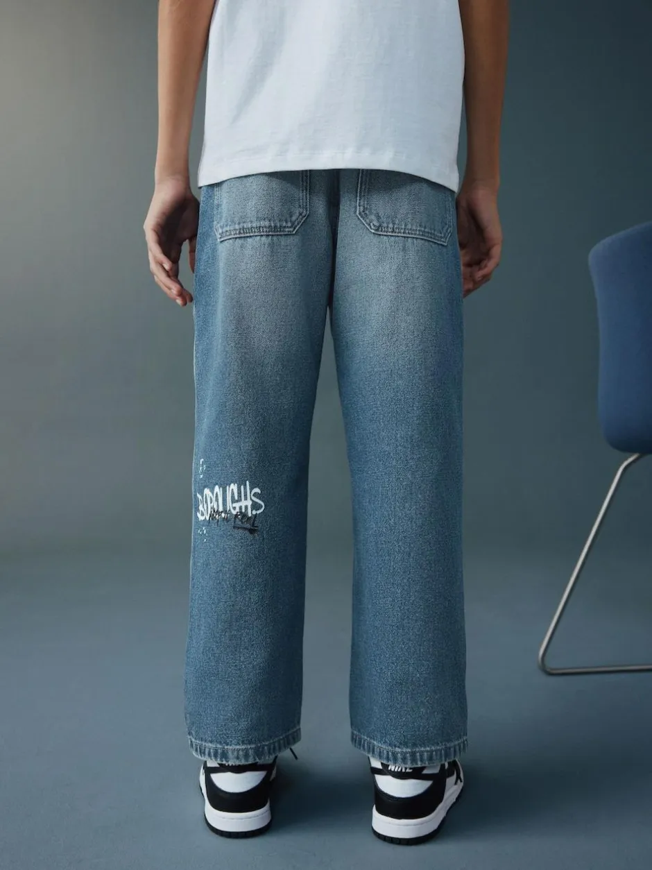 Next Varsity All-Over Print Mid Blue Denim Wide Fit Authentic Jeans (3-16yrs) New